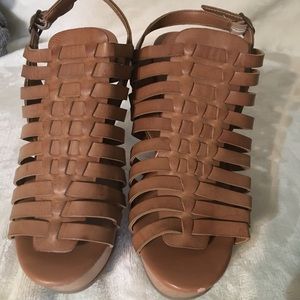 Brown wedges with crossing straps